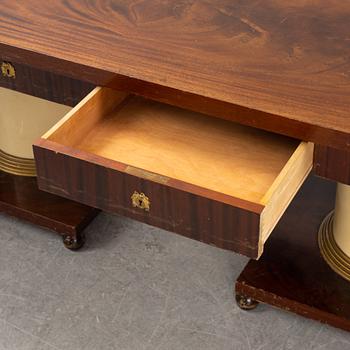 An Empire style library table, first half of the 20th century.