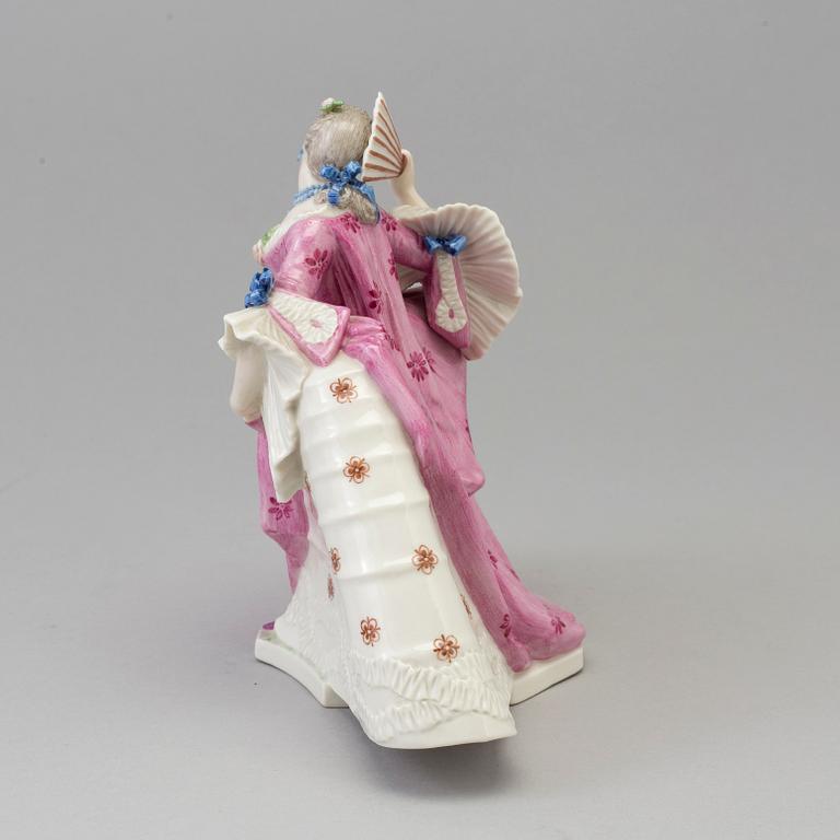 A Nymphenburg porcelain figure of a lady, Germany, 20th Century.