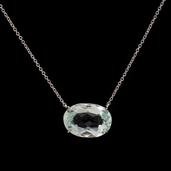 An 18K white gold necklace with an oval faceted aquamarine.