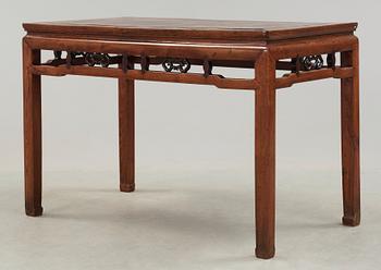 A hardwood free standing table, Qing dynasty (1662-1912).