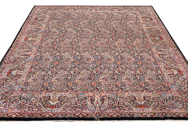 A Boteh pattern Kerman carpet, c. 475 x 342 cm.