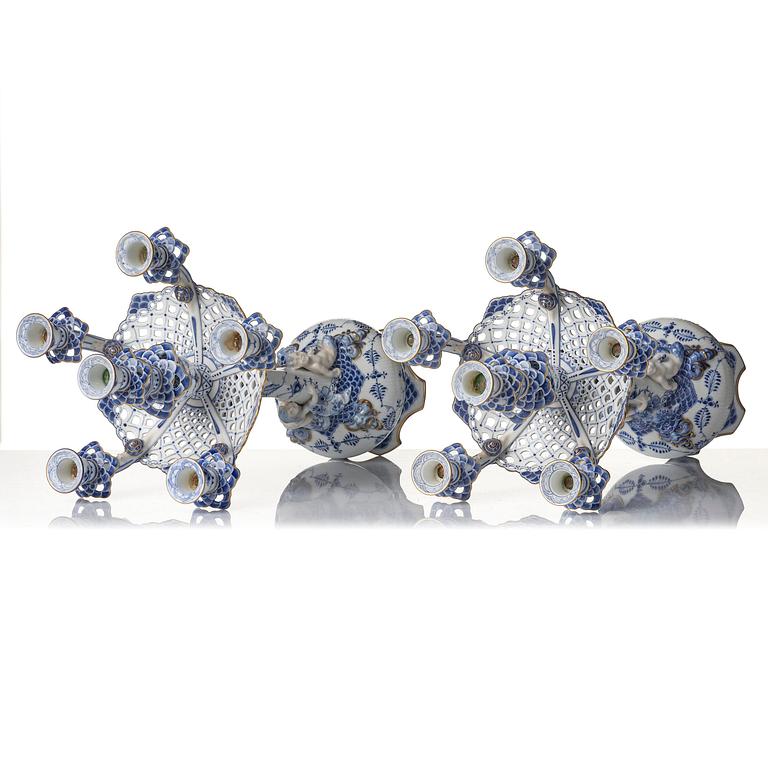 A pair of Royal Copenhagen 'Musselmalet' / 'blue fluted full lace' six-light candelabras, Denmark, 1898-1923.