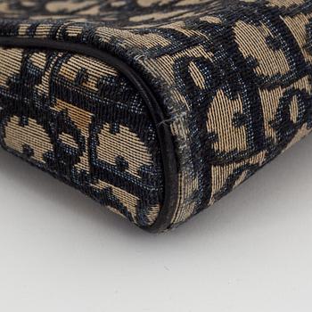 Christian Dior, a canvas handbag, toilet bag and key holder.
