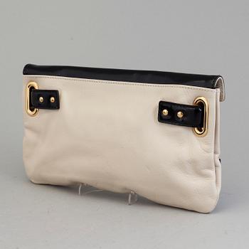 A black and white leather clutch by Balenciaga.