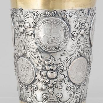 A Prussian 18th century parcel-gilt beaker, makers mark Johann Leopold Käwerstein, Königsberg 1754-1761.