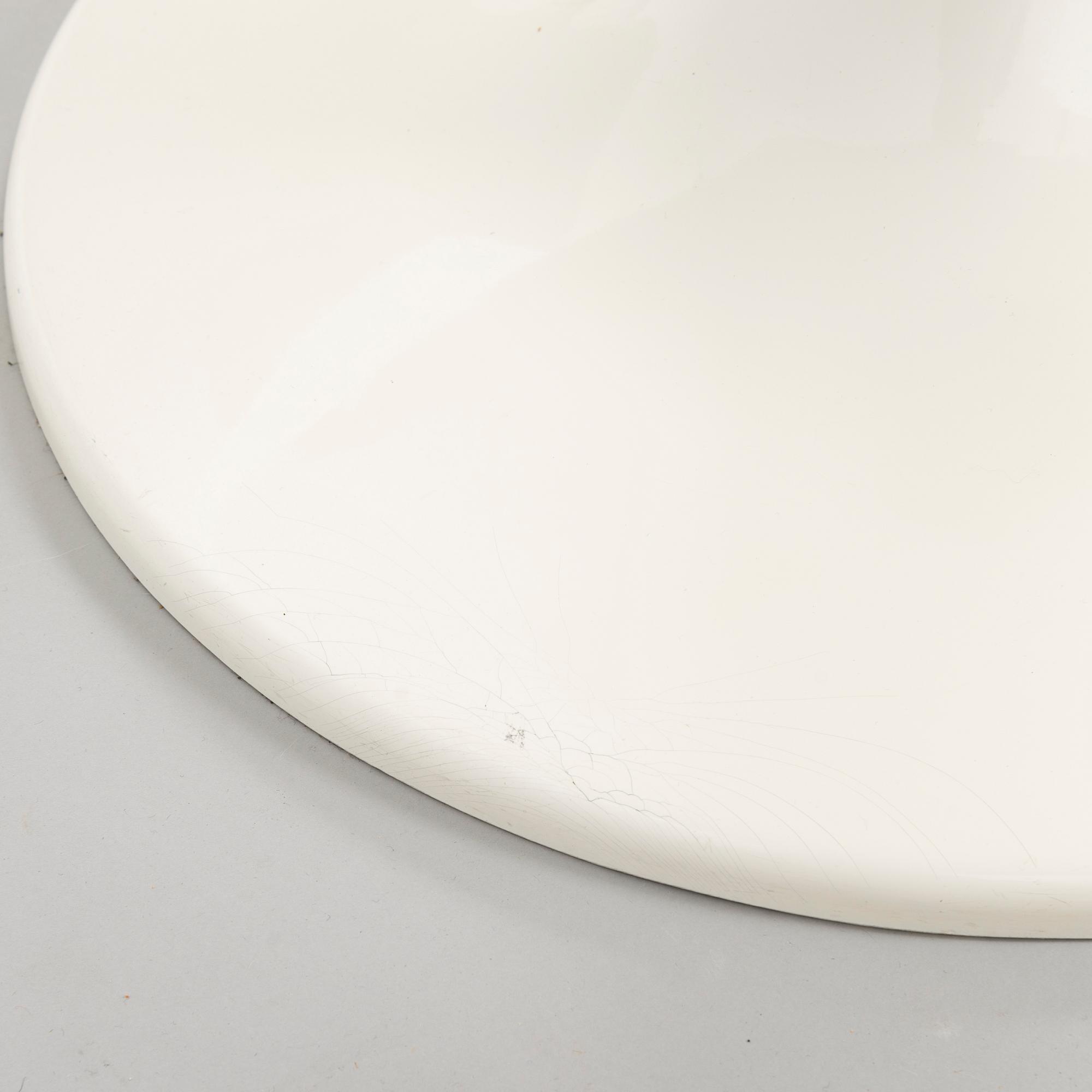 EERO AARNIO, a set of four 'Cognac' chairs by Artekno for Asko Oy.