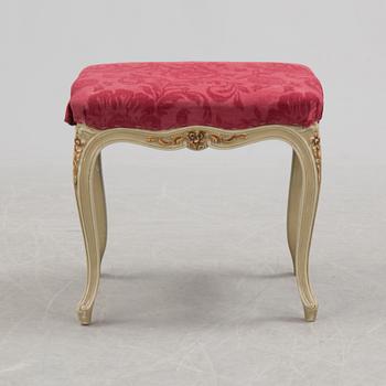 A mid 20th century Rococo style dressing table, a pair of bedside tables and one stool.