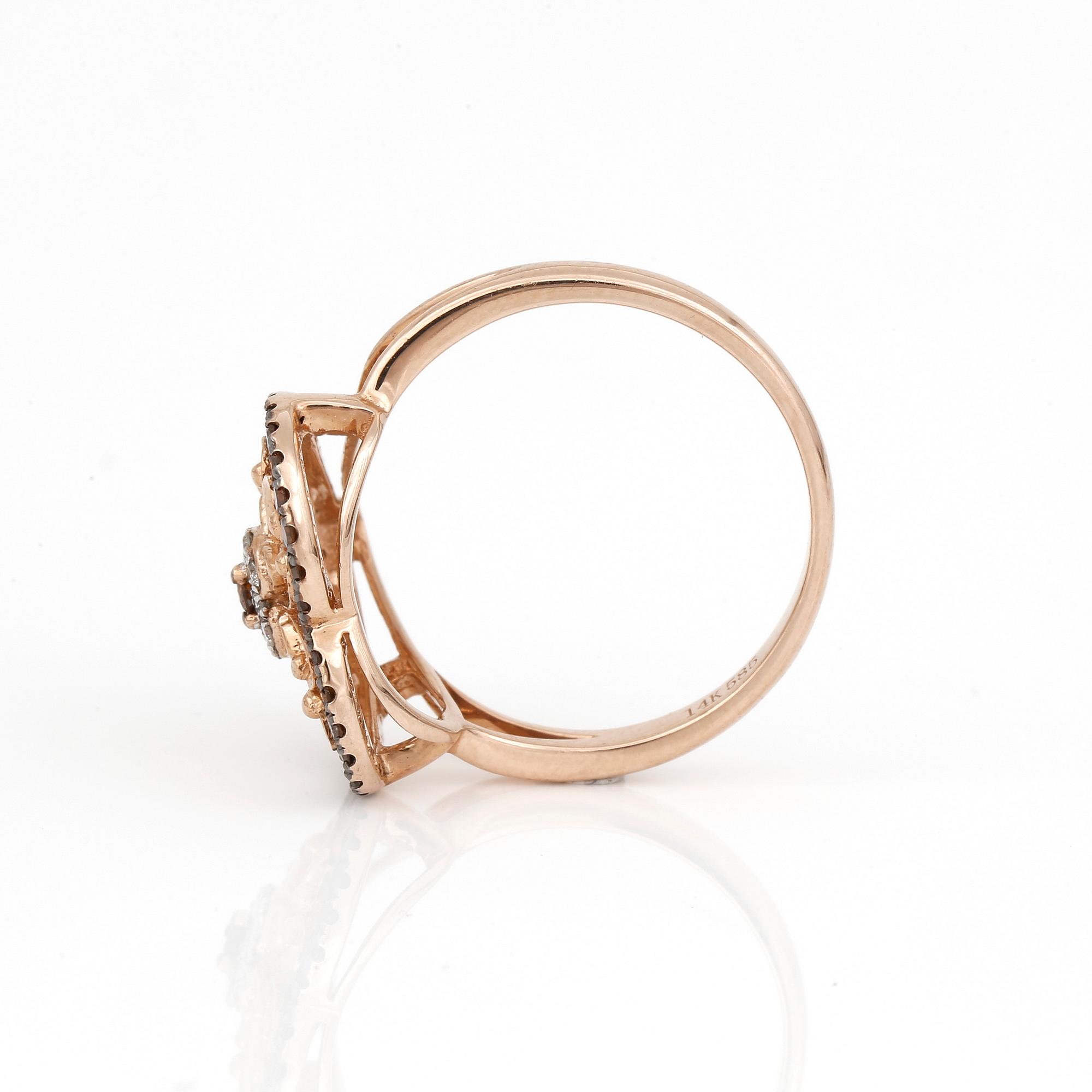RING, 14K roséguld med cognacsfärgade och färglösa diamanter. Vikt ca 3 g.