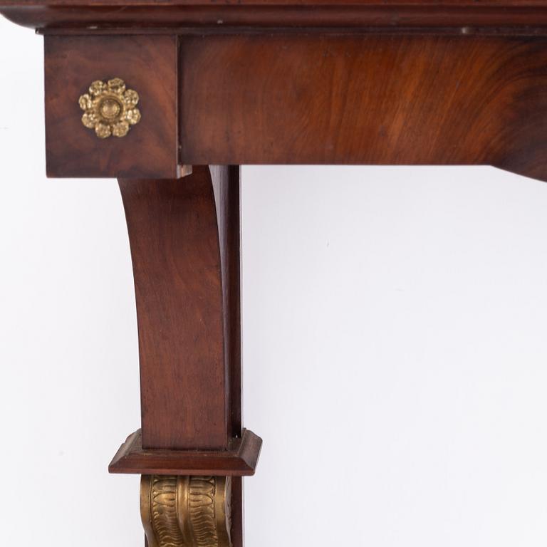 A Swedish Empire mirror and console table, first half of the 19th century.