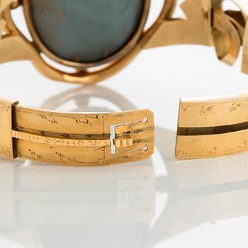 An 18K gold bracelet with an 18th century miniature portrait of Jeanne de Nesle, according to engraving.