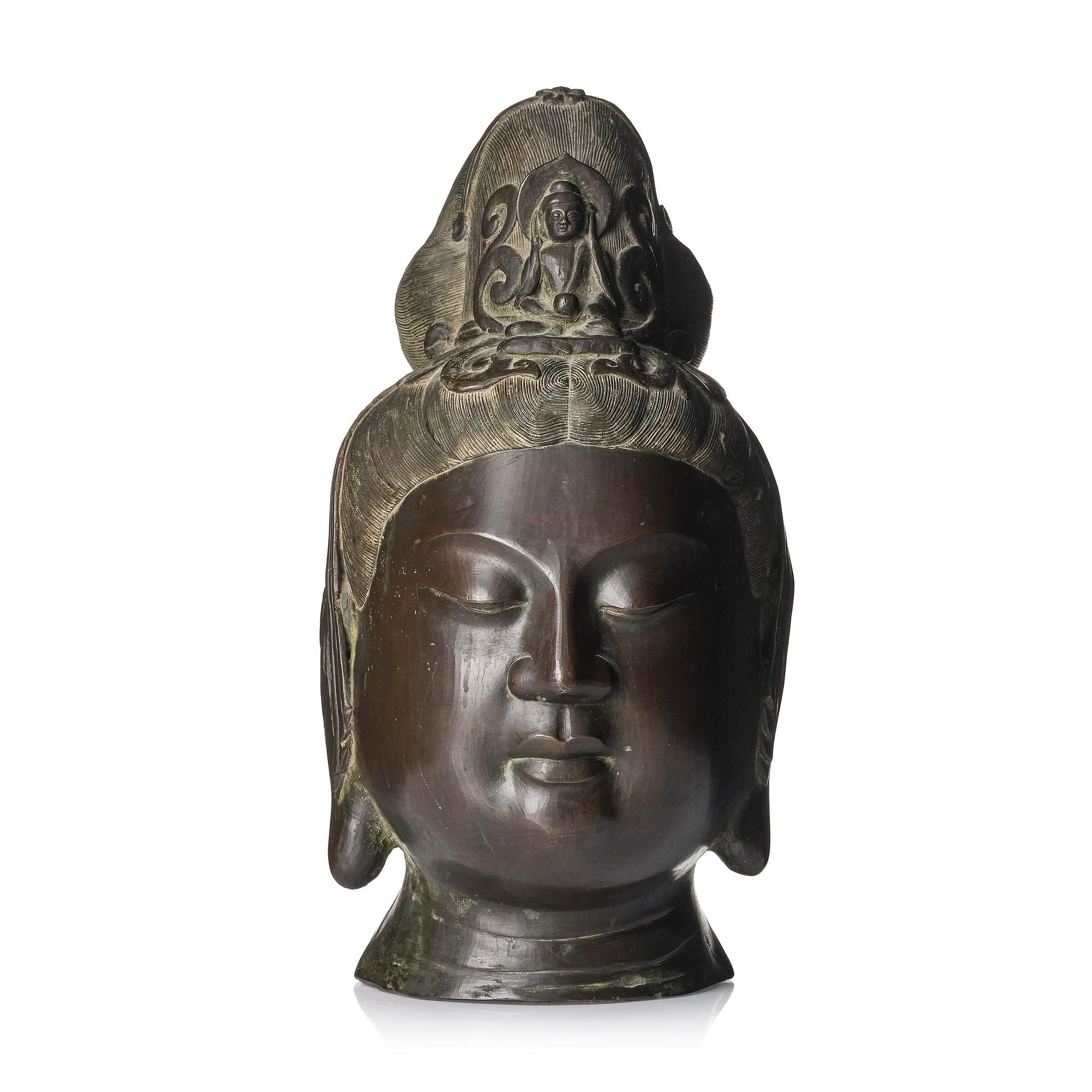 A large Chinese bronze head of Guanyin, late Qing dynasty, 19th century/around 1900.