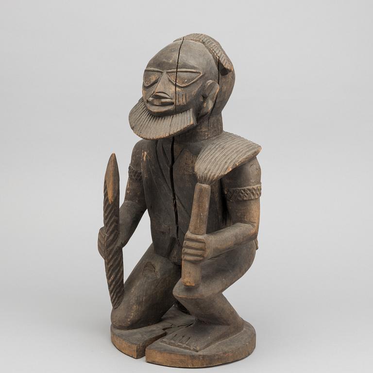 Male warrior figure, Yoruba, Nigeria.