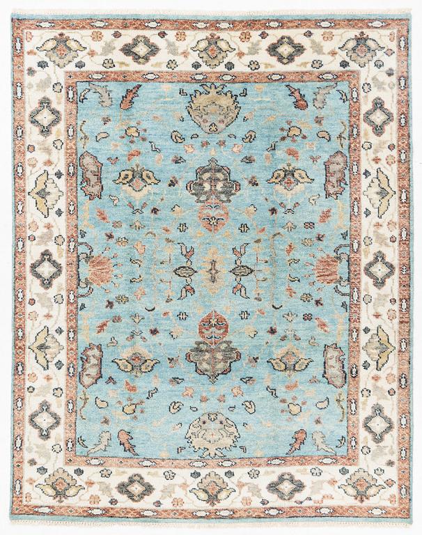 An Agra carpet, c. 302 x 239 cm.