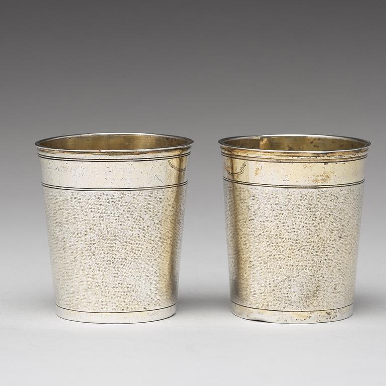 A matched pair of German 17th century parcel-gilt silver, Augsburg (1627-1665).