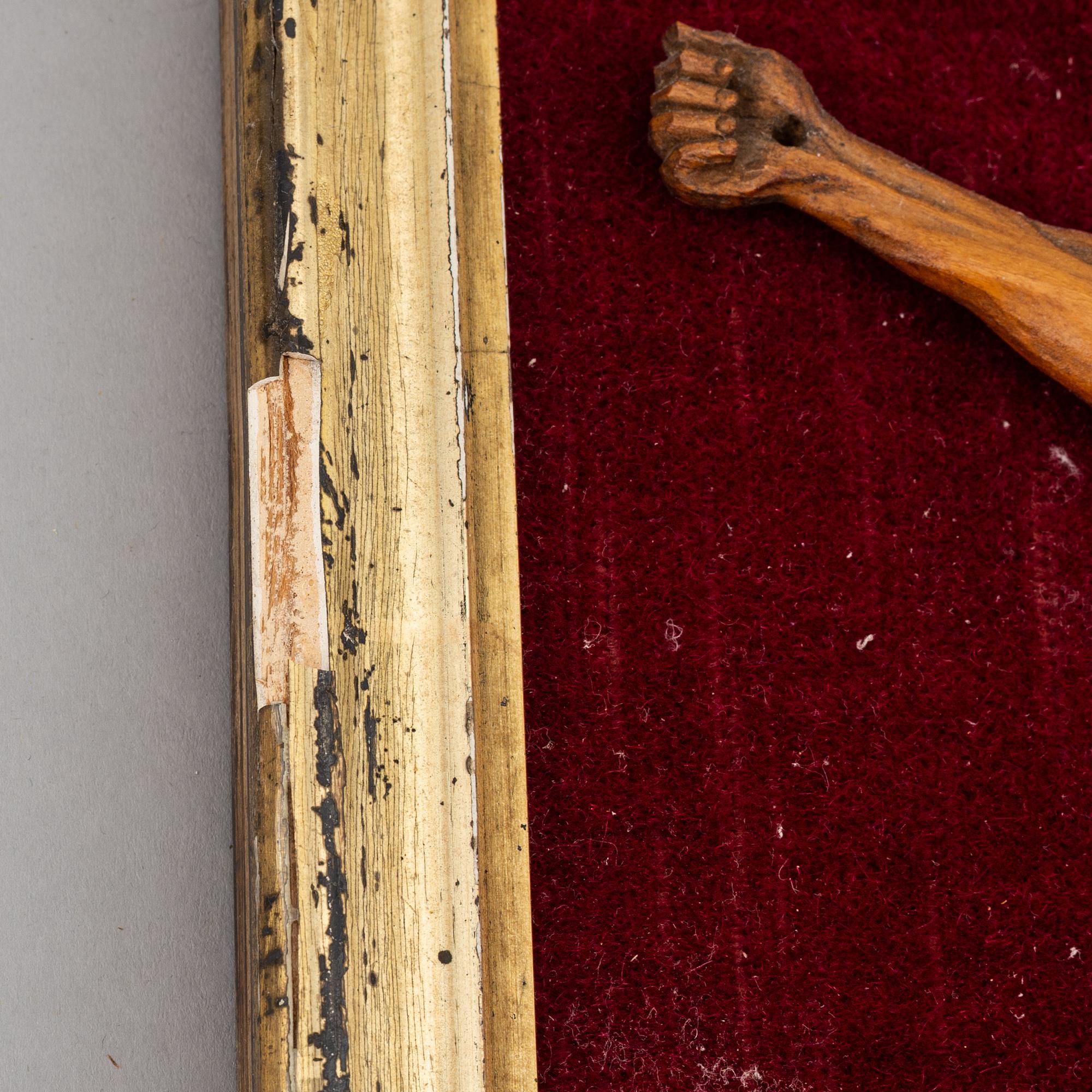 A carved wood crucifix, 17th/18th century.