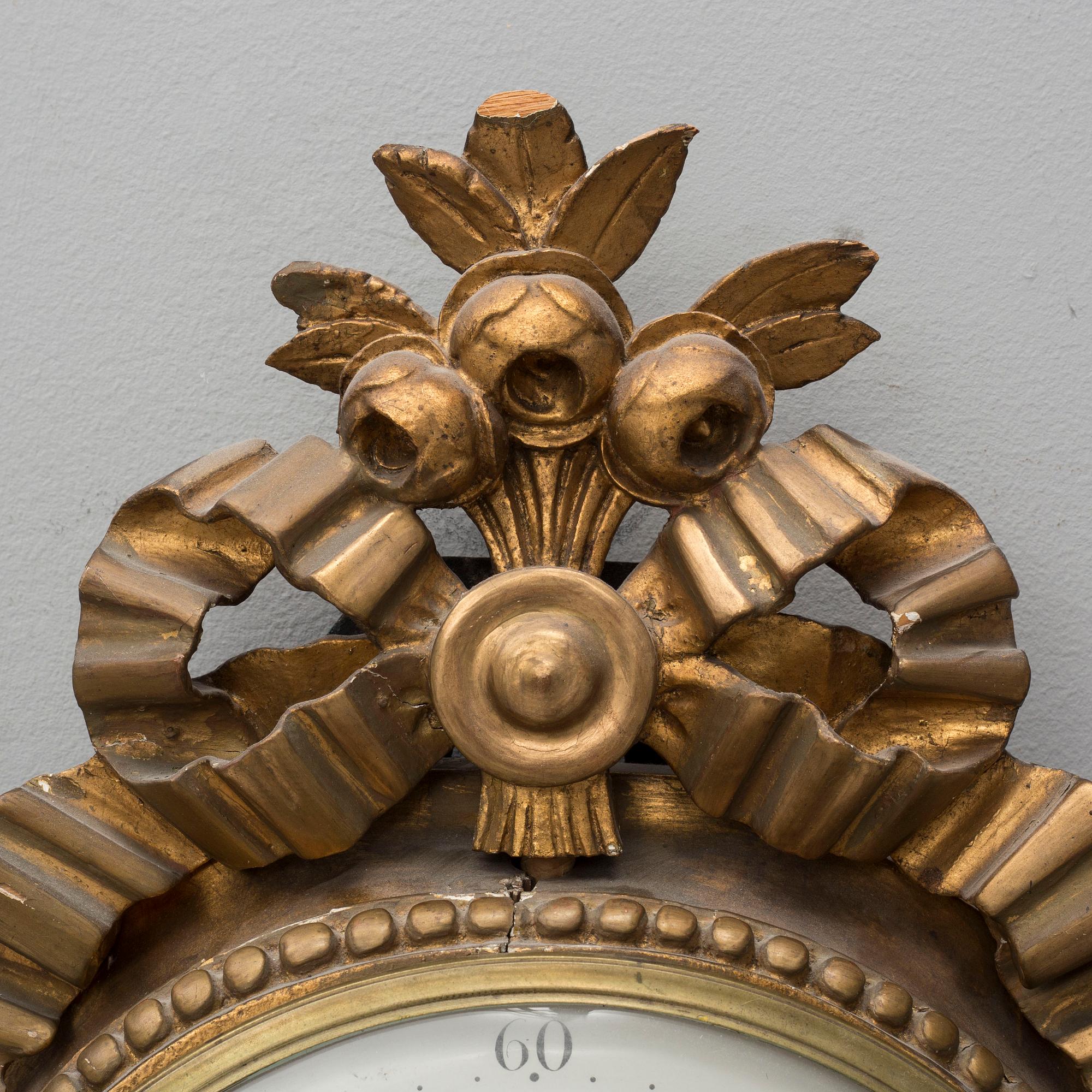 A late gustavian wall clock, signed Beurling, Stockholm. Late 18th / early 19th century.