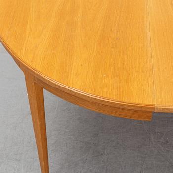 An oak dining table and four chairs by Carl Malmsten for Bodafors. Second half of the 20th Century.