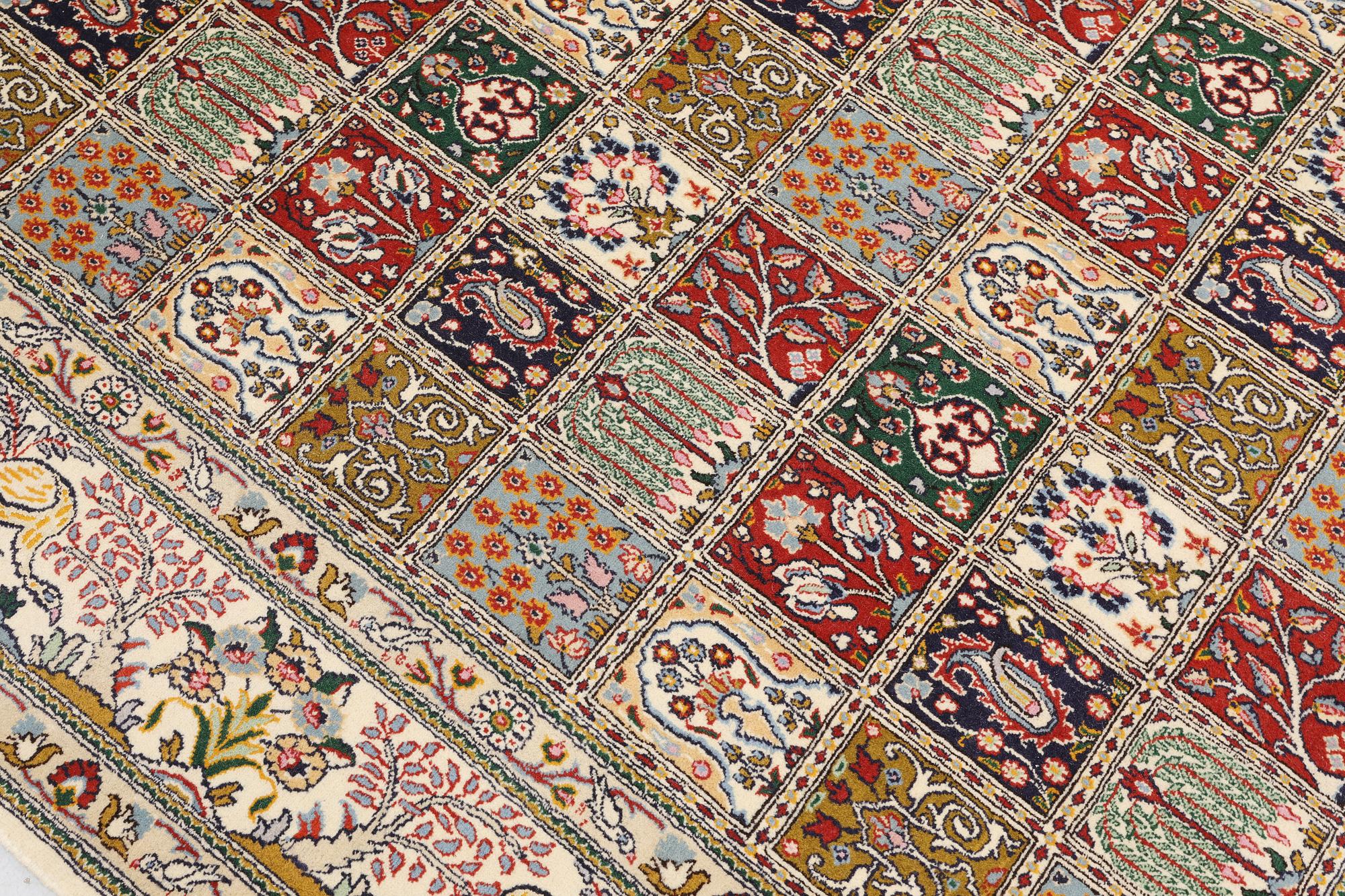 A part silk Moud rug, approx. 250 x 199 cm.