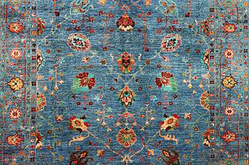 A Khorjin carpet with a Ziegler pattern, c. 307 x 252 cm.