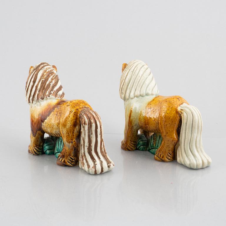 Gunnar Nylund, a pair of stoneware figurines, Rörstrand, Sweden, mid 20th century.