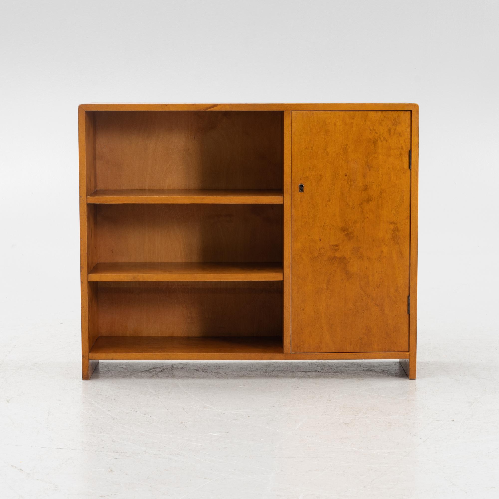 A birch wood book case with cabinet, 1930s.