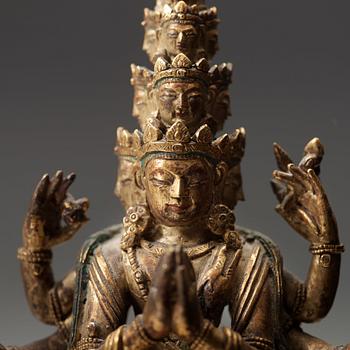 A standing figure of a 11-head Avalokiteshvara with eight arms, Tibet, circa 1800.