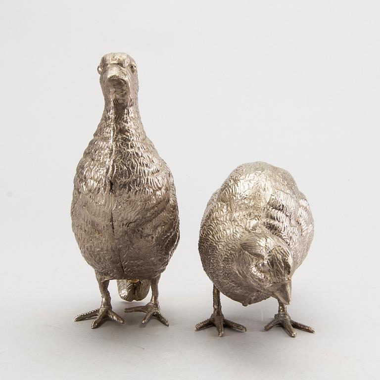 A pair of mid 20th century Italian table decorations in metal.