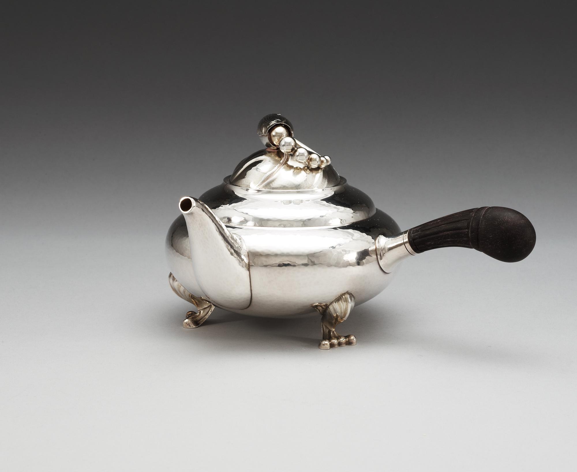 A Georg Jensen sterling 'Blossom' tea-pot, design nr 2D by Georg Jensen, Copenhagen 1996.