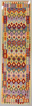 A runner, kilim 300 x 88 cm.