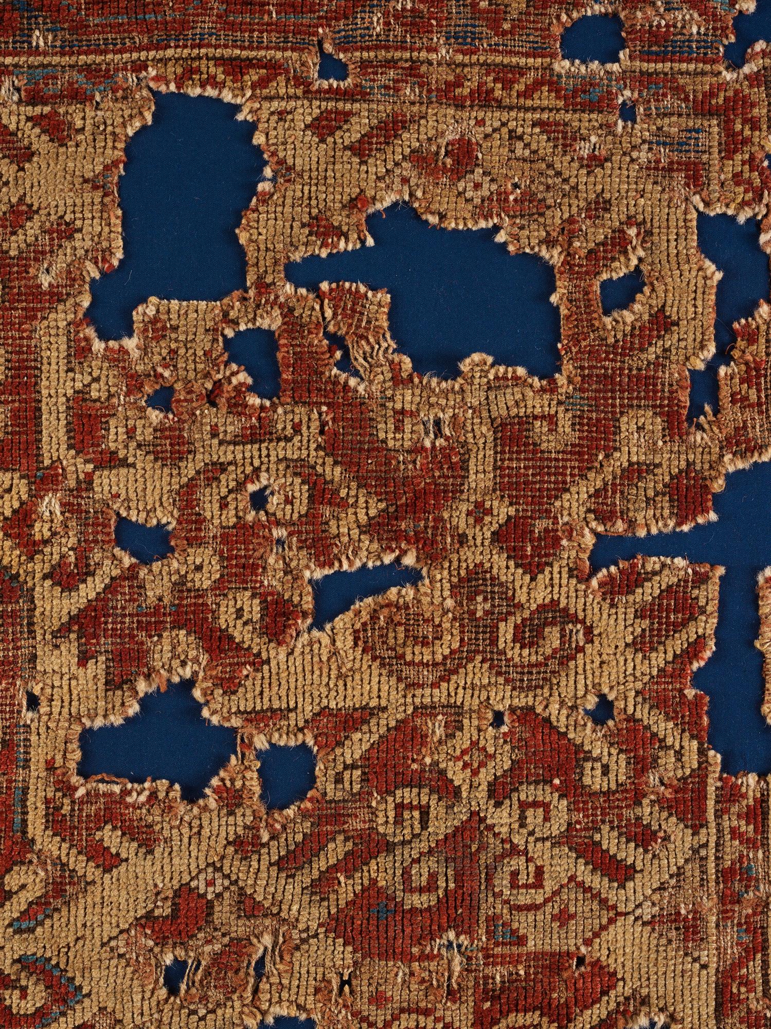 Mattfragment, antik, Västanatolisk "Lotto", 1600-tal, ca 142 x 115 cm (inklusive ram 155 x 124 cm).