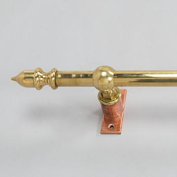 A late 20th century curtain rail / rod.