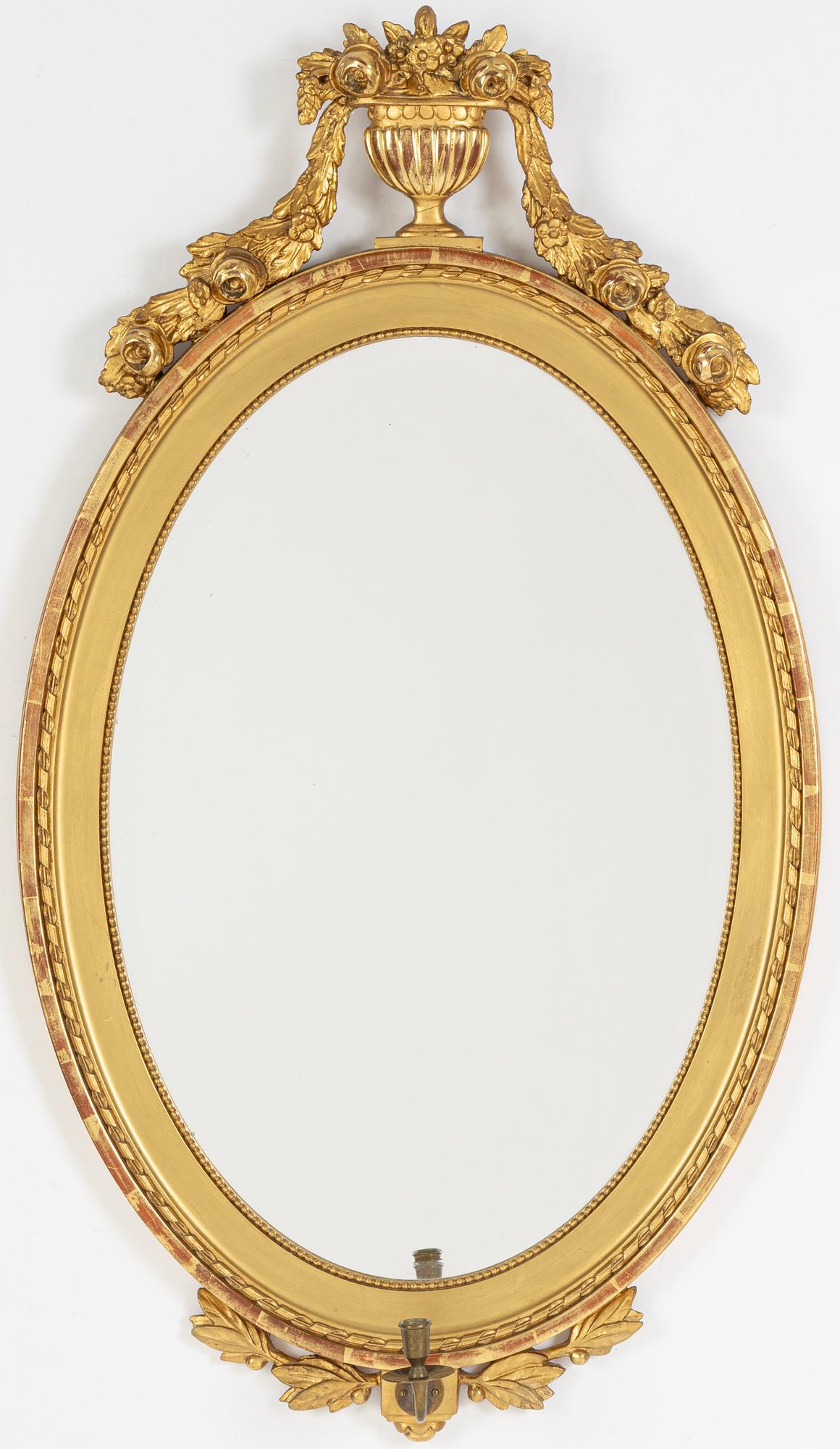 A Gustavian style mirror wall sconce, first half of the 20th Century.