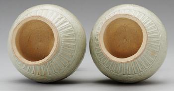 A pair of pale celadon glazed vases, Song/Yuan dynasty.