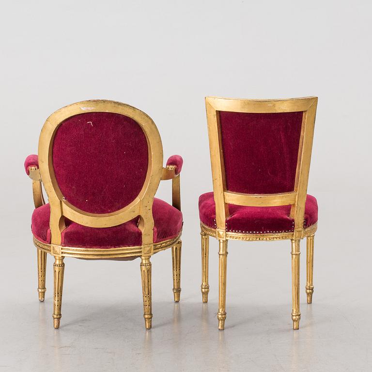 An Gustavian-style chair and armchair, early 1900's.