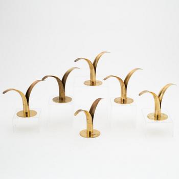 Ivar Ålenius-Björk, a set of six 'Liljan' candlesticks from Ystad Metall, mid 20th Century.