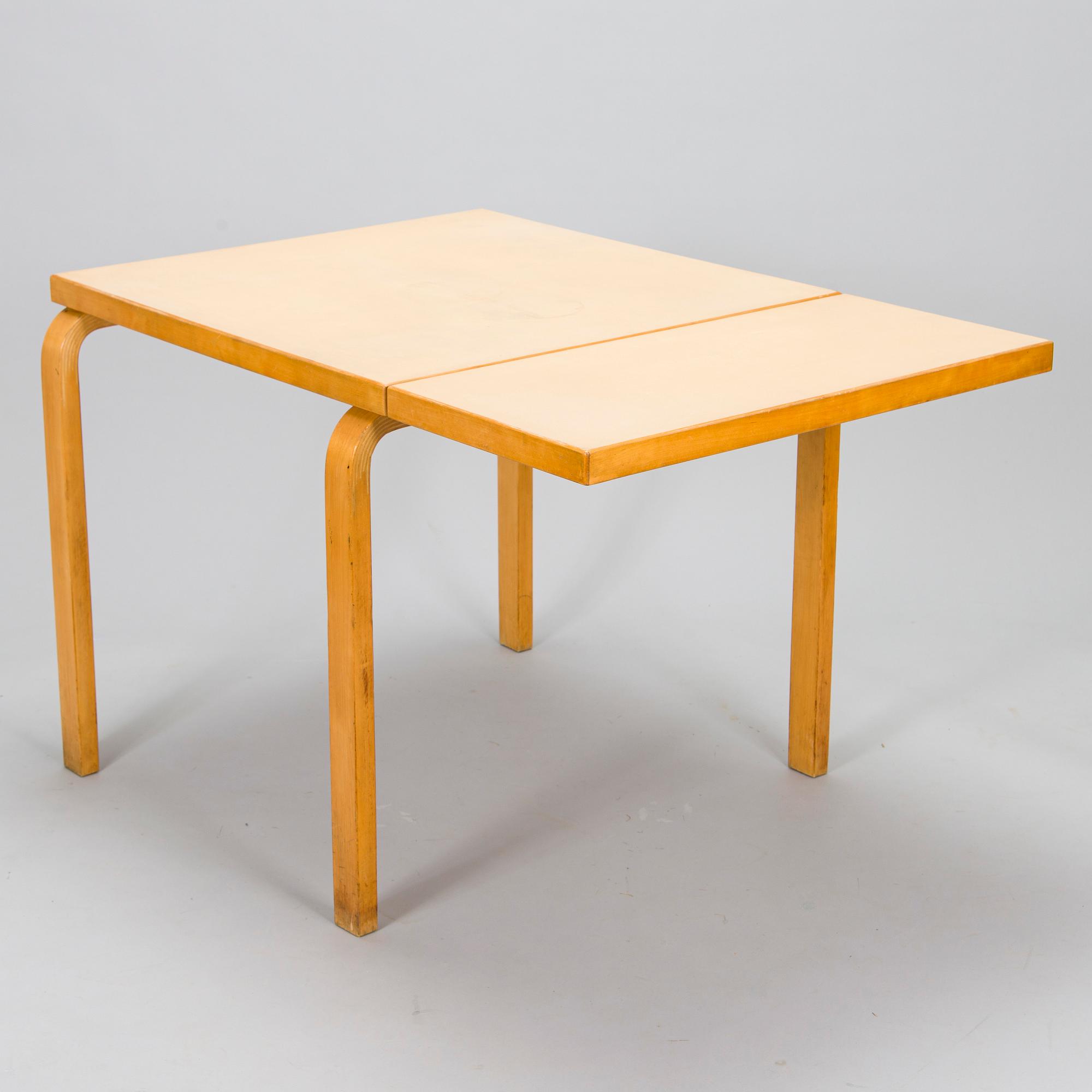 Alvar Aalto,  A mid-20th century drop leaf table. Artek Finland.
