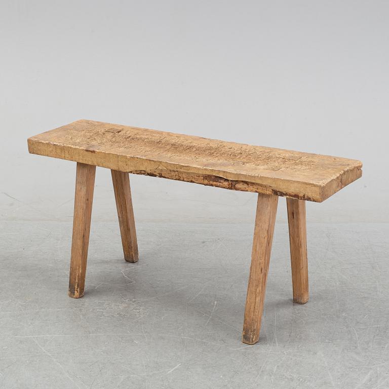 A pine bench, 19th Century.