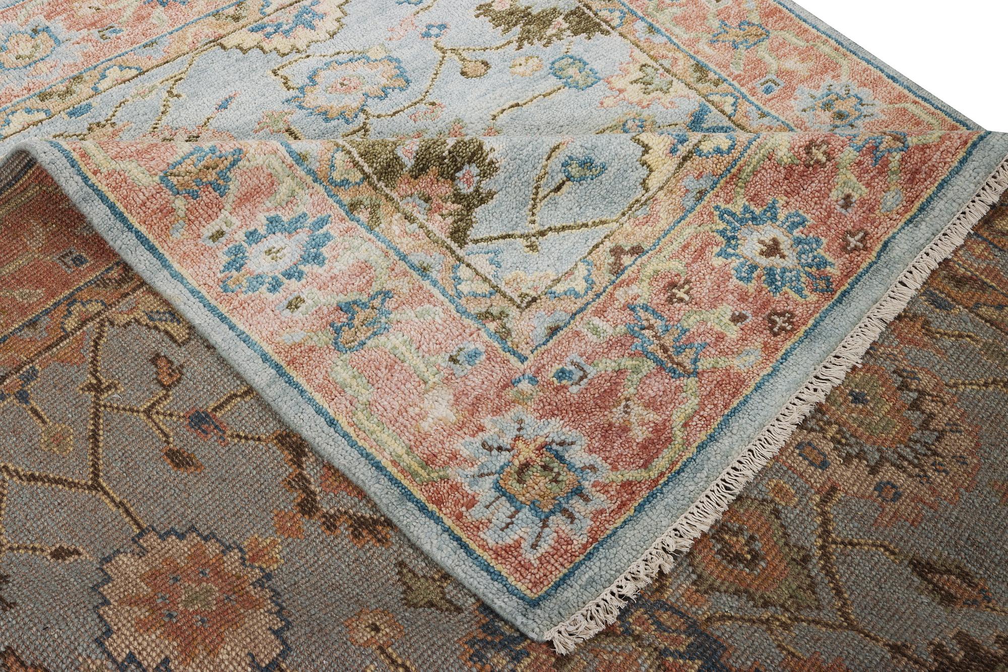 An oriental carpet with Mamluk design, c. 302 x 252 cm.