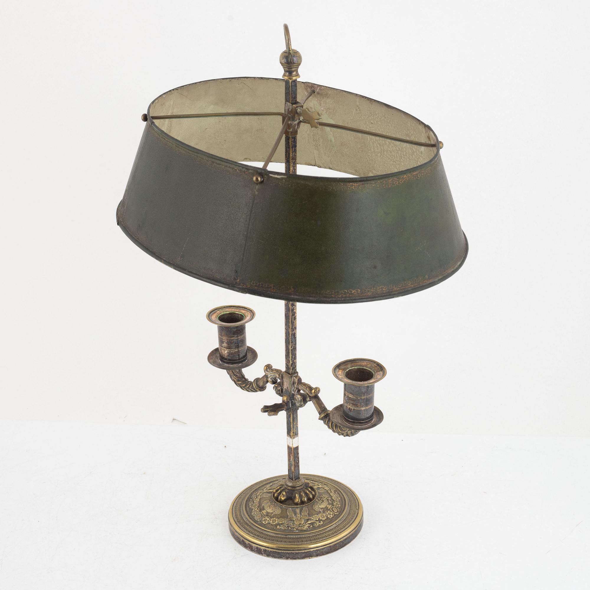 A French Empire silvered-bronze and tôle-peinte two-light reading light, early 19th century.