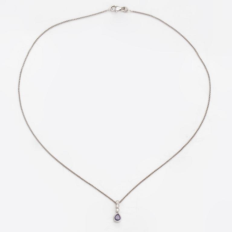 An 18K white gold necklace with a tanzanite and diamonds ca. 0.06 ct in total.