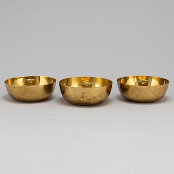 Three Vivianna Torun Bülow-Hübe brass candle golders, for Dansk International Design.