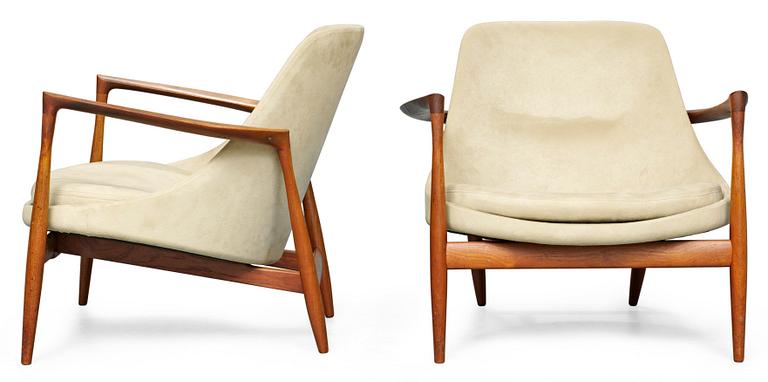 A pair of  Ib Kofoed Larsen "Elisabeth" teak easy chairs by Christensen & Larsen, Denmark, 1950's.