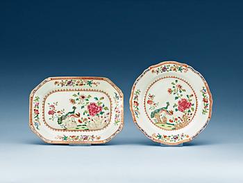 1445. A set of five famille rose 'double peacock' plates and a serving dish, Qing dynasty, Qianlong (1736-95).