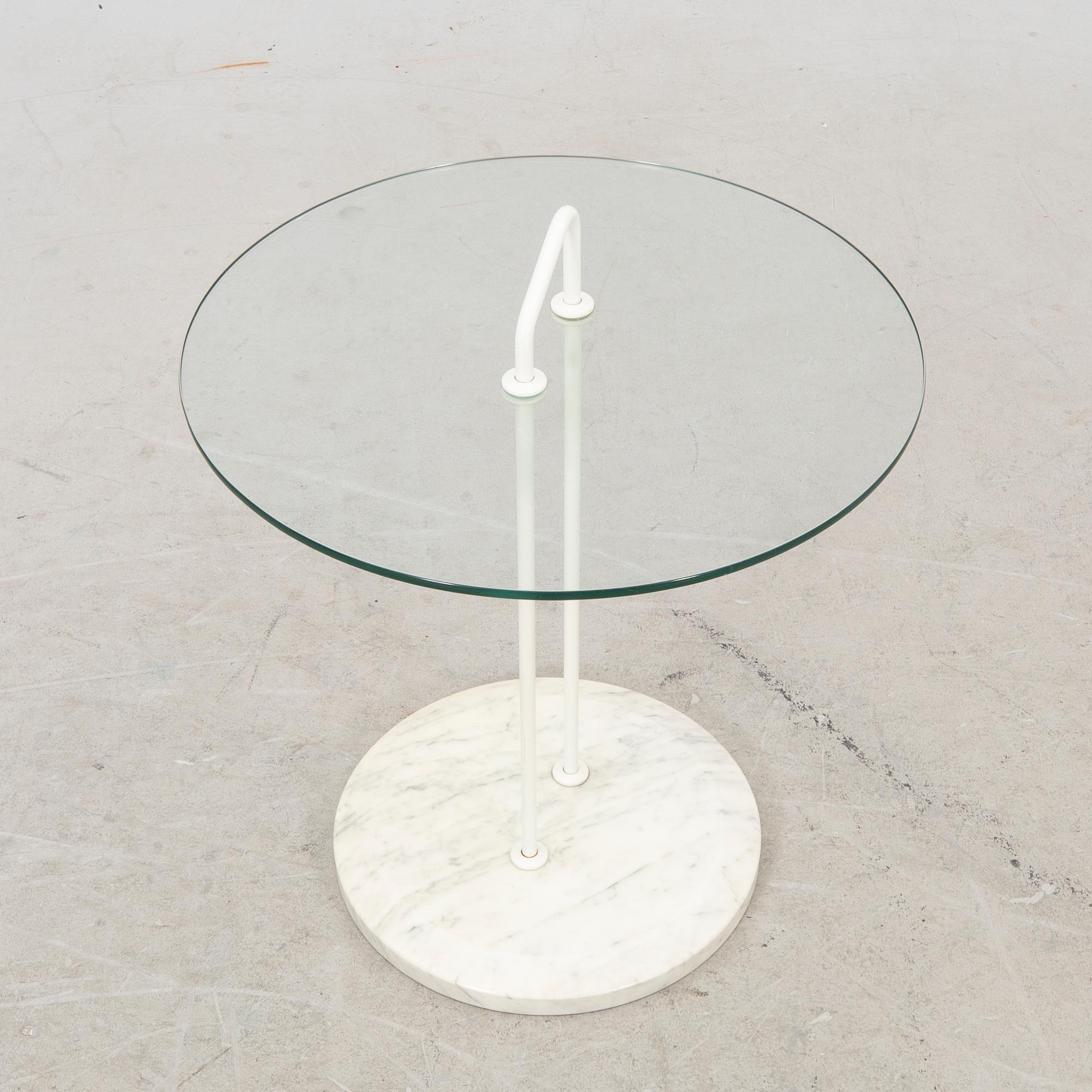 A late 20th century marble and glass side table.
