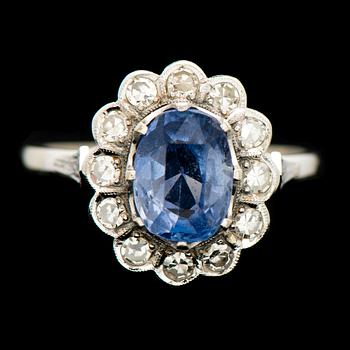 A RING, facetted sapphire, 8/8 cut diamonds, 18K white gold. Risto Karstela, Helsinki Finland 1979.