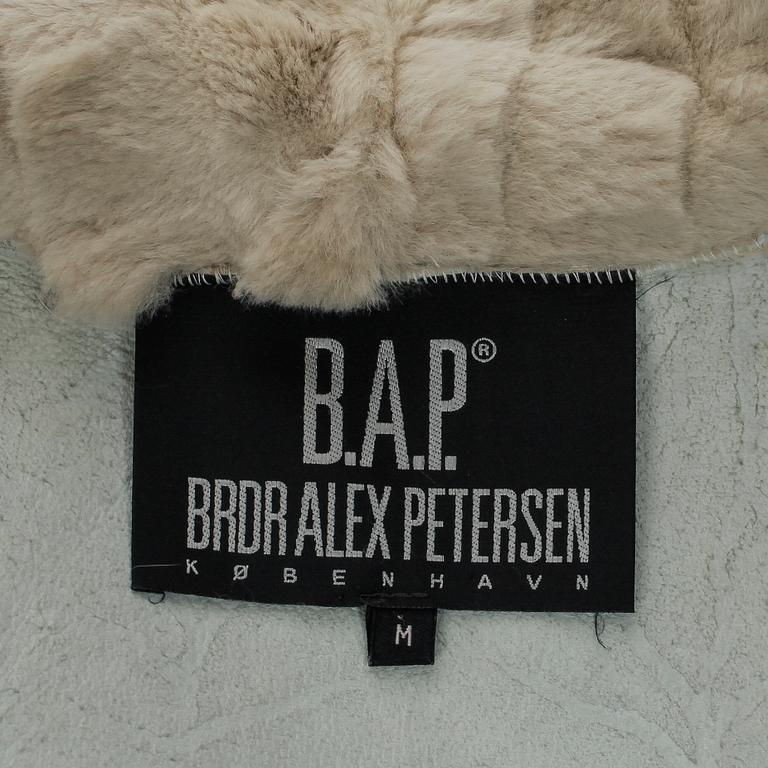 BROR AXEL PETERSEN, a beige rabbitfur coat. Size M.
