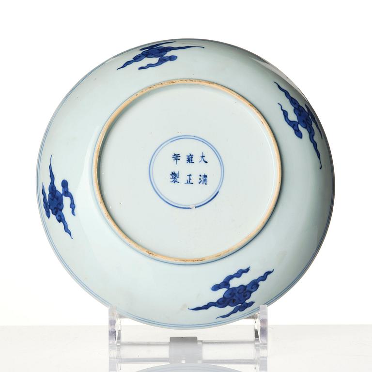 A blue and white 'dragon' dish, Qing dynasty with Yongzheng six character mark and of the period (1723-35).