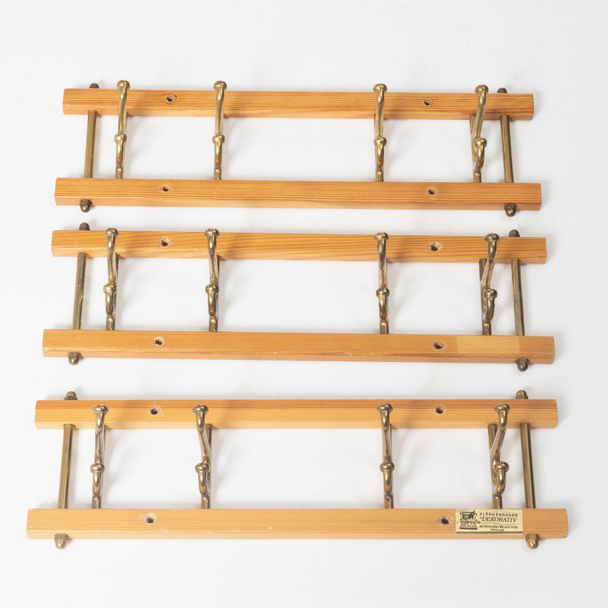 A set of three 'Decorative' coat hangers, Skoglunds metallgjuteri, Anderstorp, 1950s/60s.