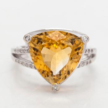 An 18K white gold ring with a citrine and diamonds. Mauboussin, Paris.
