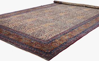 An antique 'Millefleur' Kerman Laver carpet, c. 964 x 426 cm.